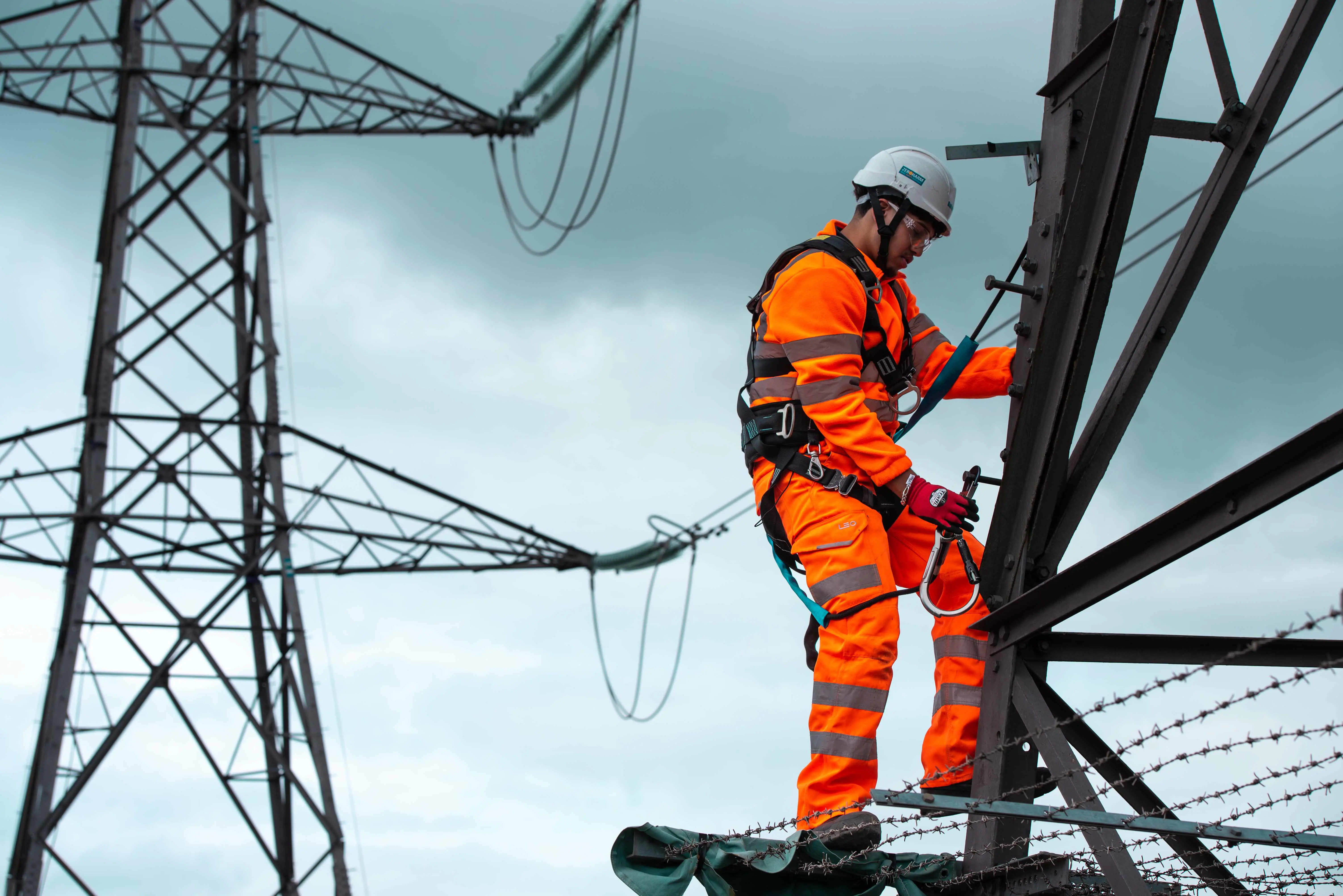 Balfour Beatty employee working on an overhead line