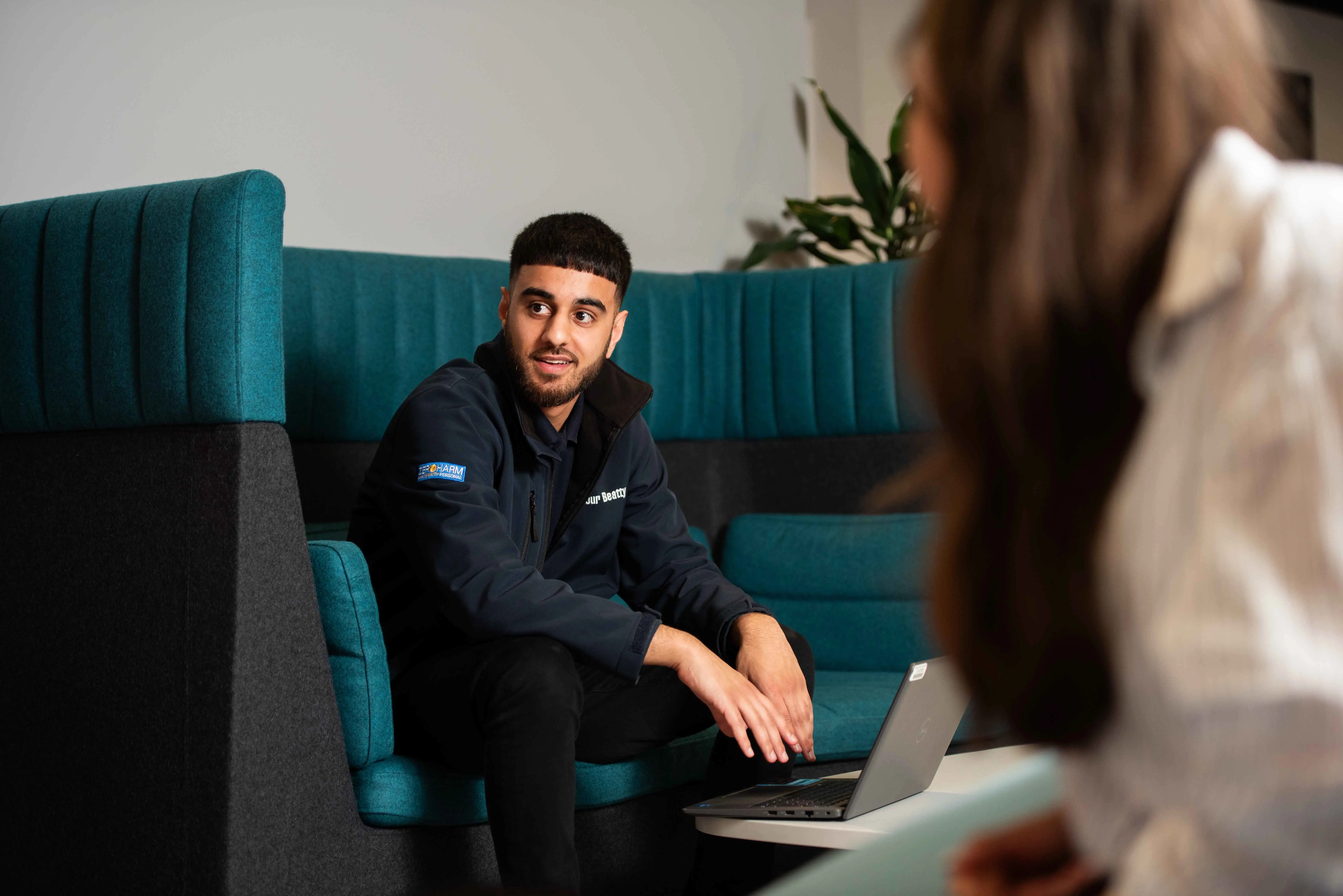 Balfour Beatty employee working on a laptop