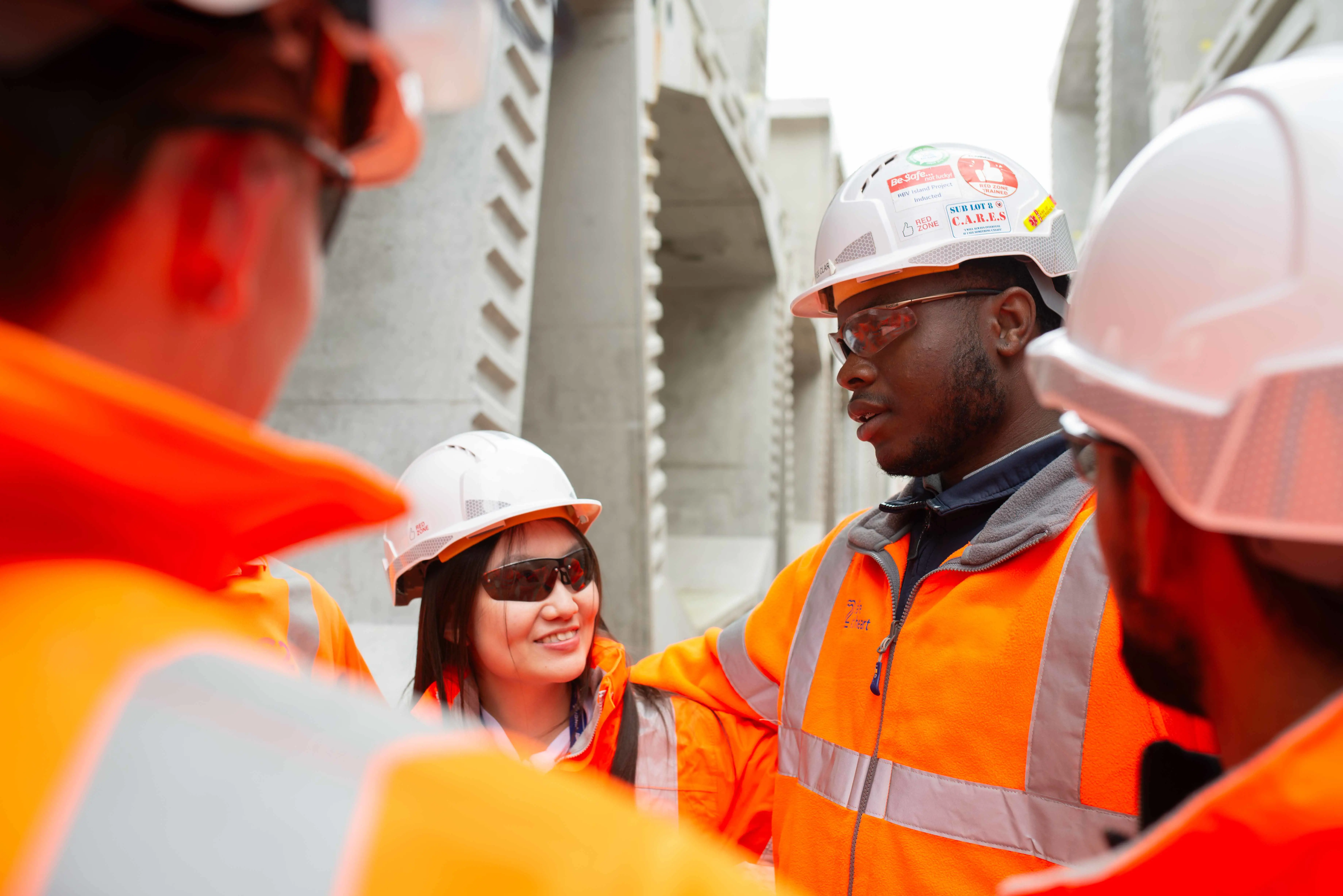 A group of colleagues working together on site