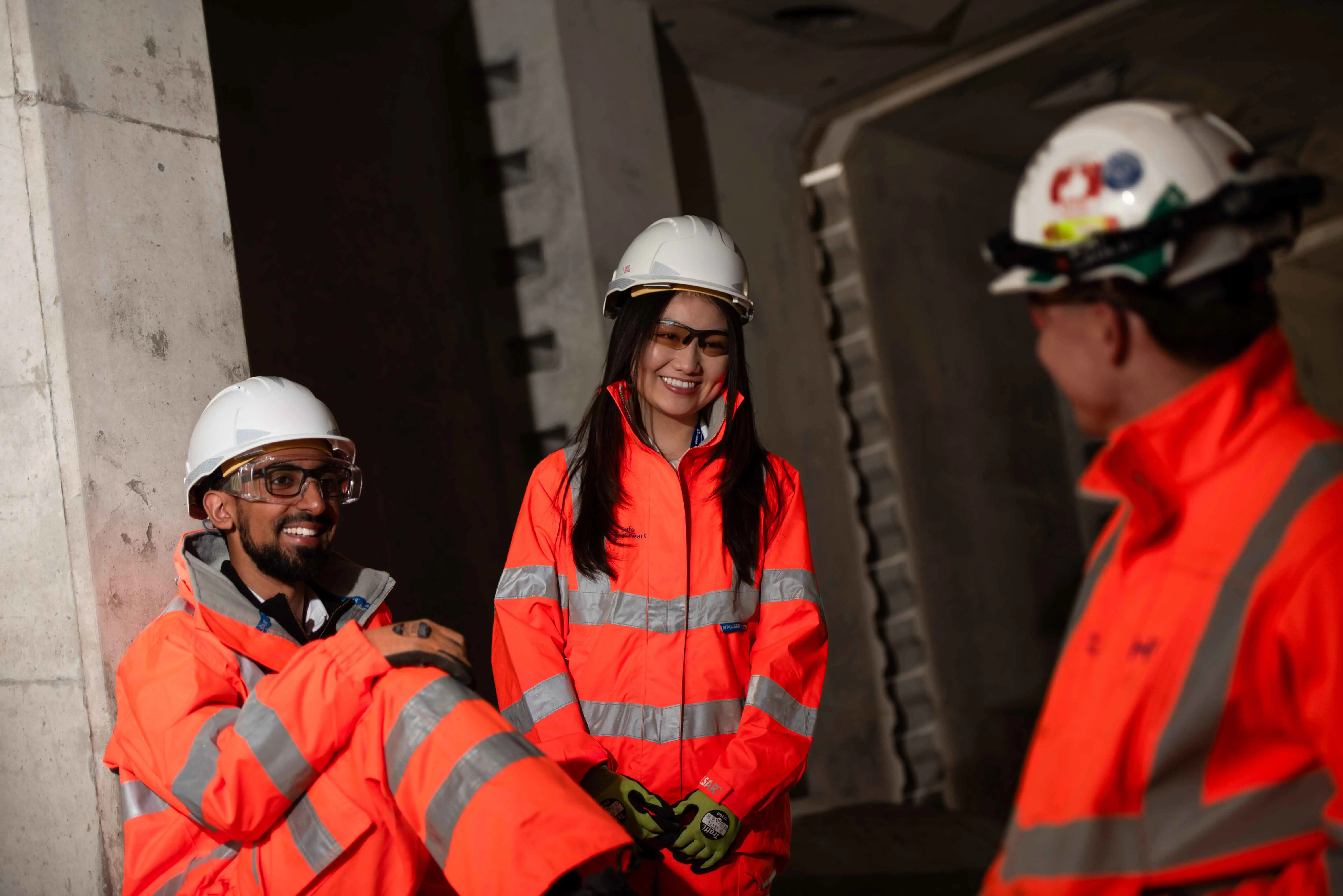 A group of colleagues working together on site