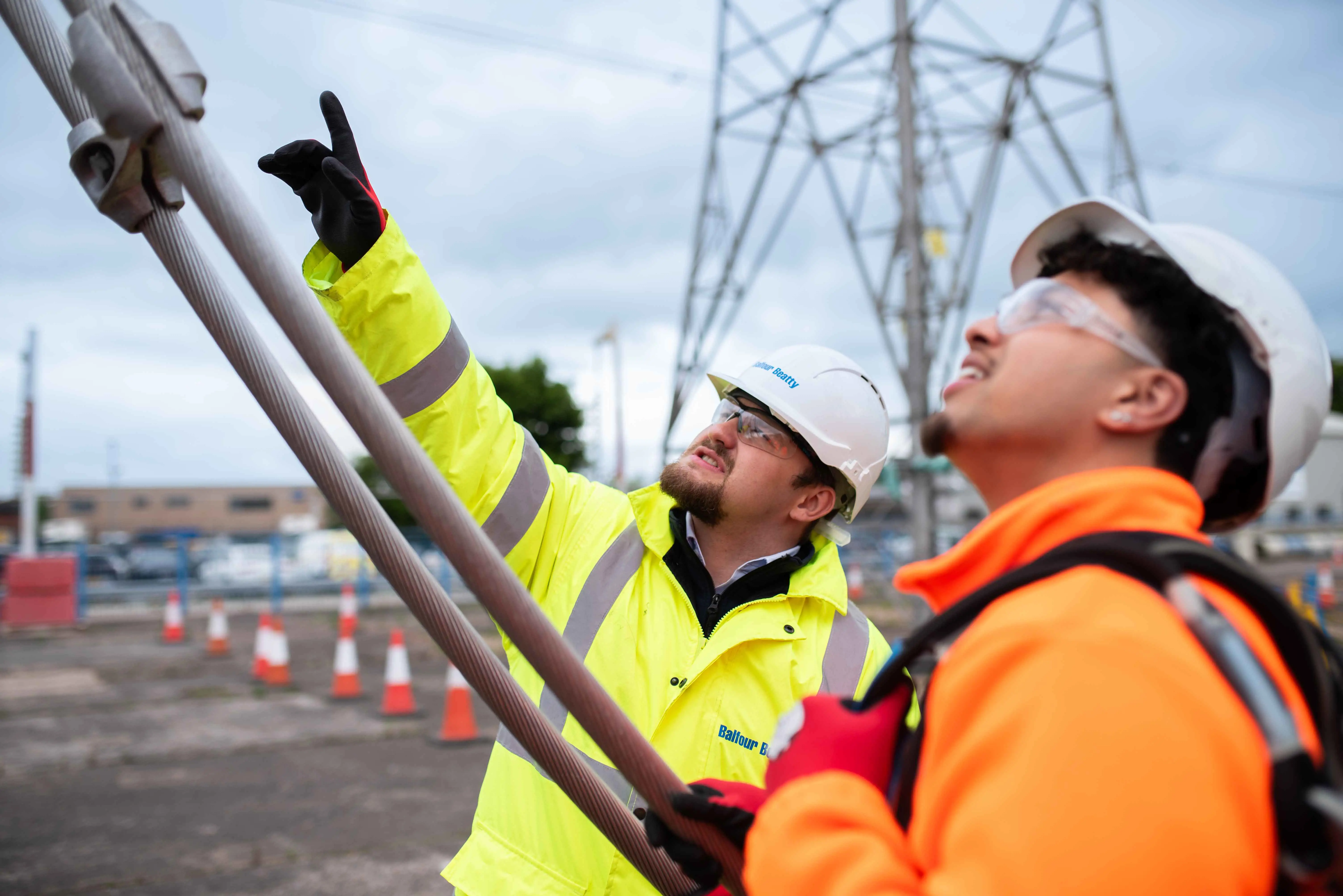 Two colleagues working on an overhead line